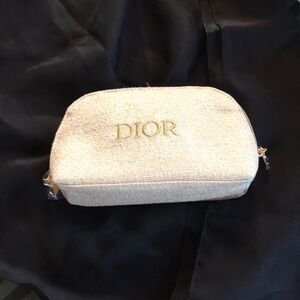 Beautiful gold Dior cosmetic bag